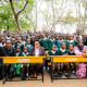 WAZIRI DKT. STERGOMENA TAX ATIMIZA AHADI YAKE KWA KUKABIDHI MADAWATI 80 SHULE YA MSINGI NYAMBITILWA MAGU